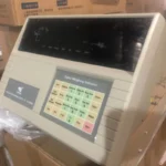 Angled product photo of the XK3190-DS3 digital weighing indicator with display and keypad